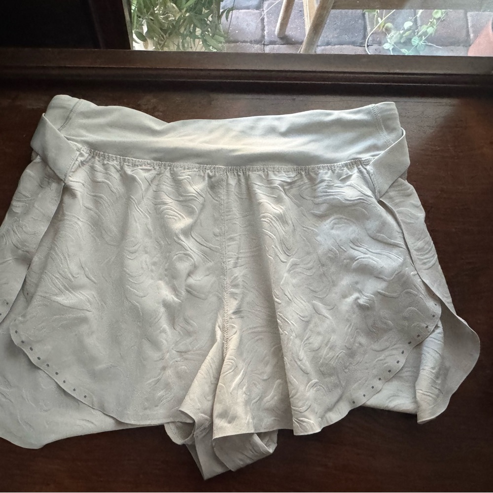 Fast and free white embossed shorts